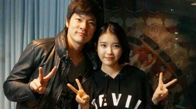 IU dan Jang Ki Ha (via soompi.com)