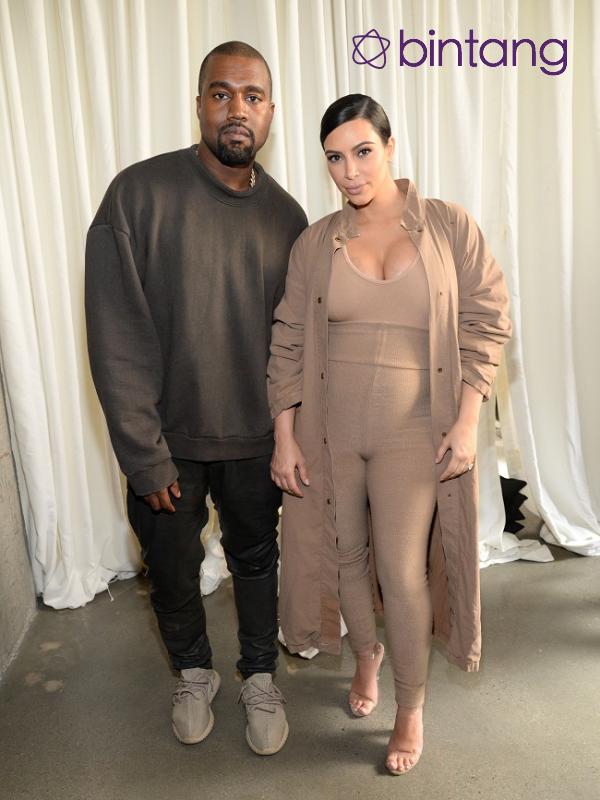 Kanye West dan Kim Kardashian. (AFP/Bintang.com)