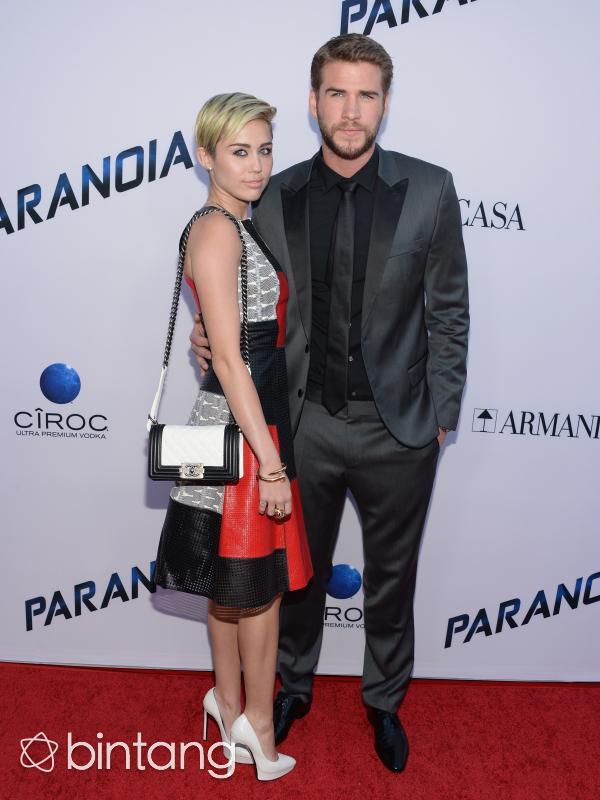 Miley Cyrus dan Liam Hemsworth (AFP/Bintang.com)