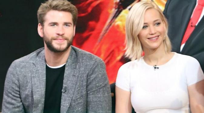 Liam Hemsworth Jennifer Lawrence terjerat cinta lokasi usai `The Hunger Games` [foto: mirror]