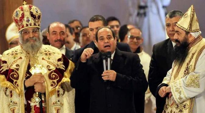 Kepala Negara Hadiri Perayaan Natal Kristen Ortodoks 7 Januari. Presiden Mesir, el-Sissi untuk pertama kalinya hadir di perayaan natal (AFP)