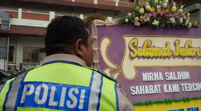 Situasi di rumah duka Mirna Salihin, wanita yang meninggal usai minum kopi di Grand Indonesia. (Richo Pramono/Liputan6.com)