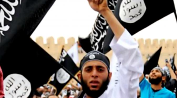 image of men waving ISIS flag