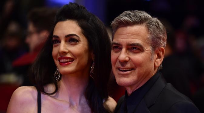 Amal dan George Clooney tengah menanti kelahiran anak kembar. (Foto: AFP)