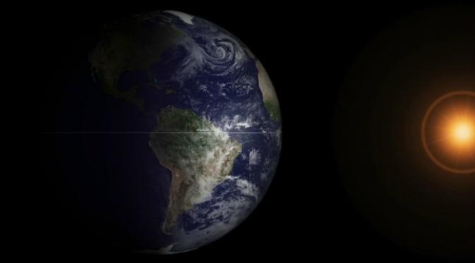 Satelit GOES-13 milik NOAA mengambil foto Bumi pada saat ekuinoks musim semi 20 Maret 2013, jam 7.45 pagi waktu Pantai Timur AS. (Sumber NOAA via livescience.com)