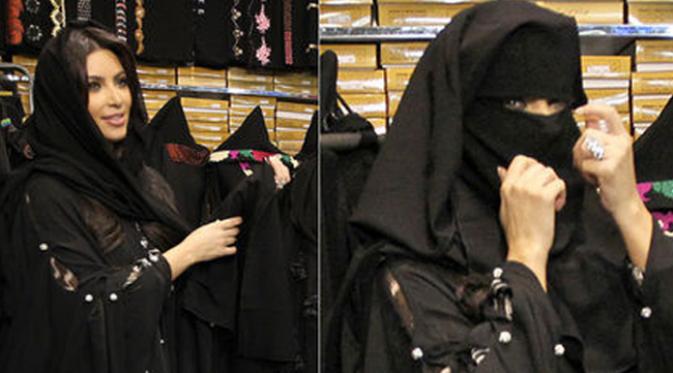 Kim Kardashian mengenakan kaftan dan burka di Dubai