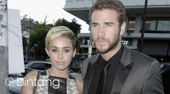Miley Cyrus dan Liam Hemsworth (AFP/Bintang.com) 