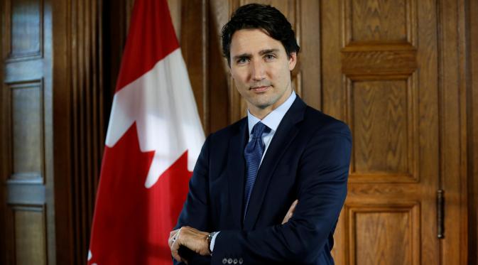PM Kanada Justin Trudeau melakukan sesi wawancara di Parliament Hill, Ontario , Kanada , 19 Mei 2016. Pria itu mengedepankan isu kesetaraan dalam kampanyenya dan dibuktikan dengan rencananya menyambut 25.000 pengungsi Suriah. (REUTERS / Chris Wattie)