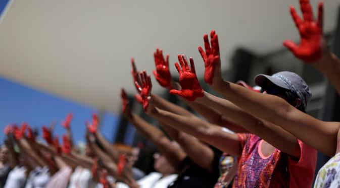 Demo menentang pemerkosaan berlangsung di Brasil (Reuters)