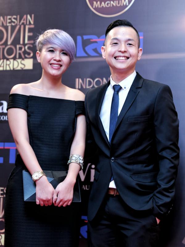 Ernest Prakasa dan istri. (Adrian Putra/bintang.com)