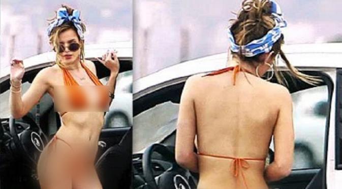 Bella Thorne tak malu menunjukan sisi tubuhnya dalam balutan bikini yang sangat seksi, (RadarOnline)