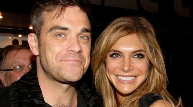Robbie Williams bersama dengan sang istri, Ayda Field (The Sun)