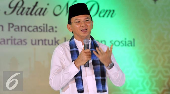 Gubernur DKI Jakarta, Basuki Tjahaja Purnama memberikan sambutan saat menghadiri acara buka puasa bersama Partai Nasdem, Jakarta, Kamis (9/8). (Liputan6.com/Johan Tallo)