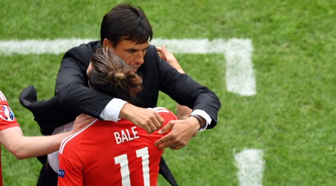 Reaksi bintang tim nasional Wales, Gareth Bale, usai membobol gawang Slovakia, pada pertandingan Grup B Piala Eropa 2016, di Stade de Bordeaux, Sabtu (11/6/2016). (AFP/Mehdi Fedouach).