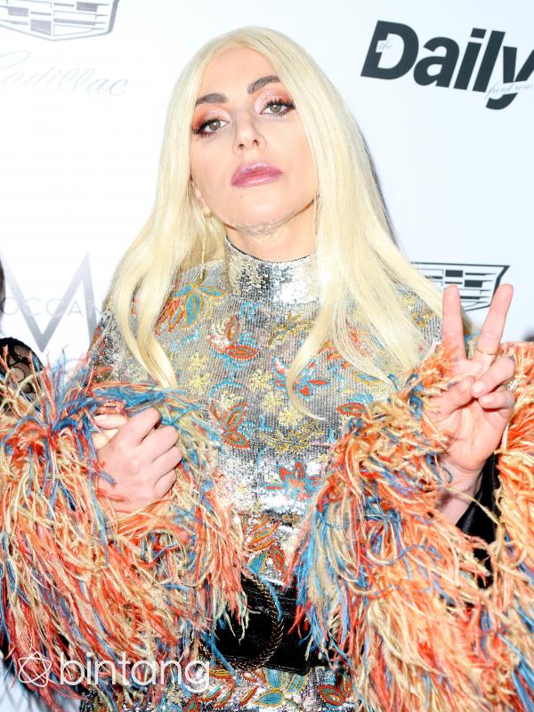 Penyanyi yang kerap tampil unik dan nyentrik, Lady Gaga memang selalu menarik perhatian publik. Pelantun 'Bad Romance' ini memperoleh pendapatan sebesar 788 Milyar dalam kurun waktu setahun. (AFP/Bintang.com)