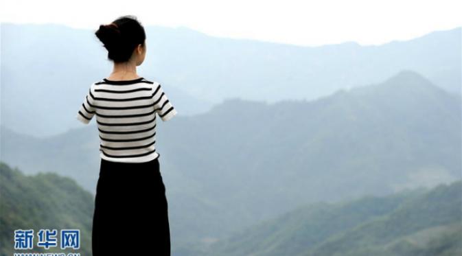 Yang Pei, seorang perempuan yang berasal dari Provinsi Shaanxi, iongkok yang memiliki keterbatasan fisik.(Shanghaiist.com)