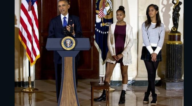 Obama didampingi kedua putrinya, Malia dan Sasha (CNN)