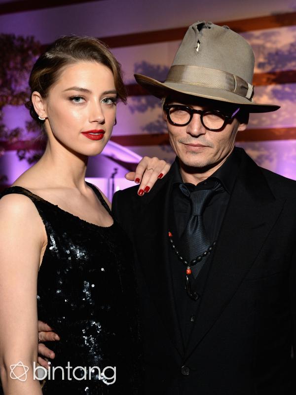 Johnny Depp dan Amber Heard resmi berpisah. (AFP/Bintang.com)