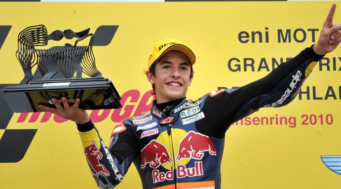 Marc Marquez, saat menang di kelas 125 cc dan meraih kemenangan pertama di sirkuit Sachsenring. (AFP/Johannes Eisele)