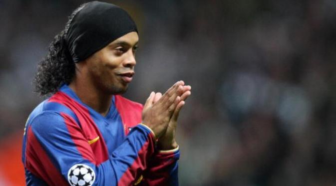 Mantan gelandang Barcelona, Ronaldinho. (AFP/Andrew Yates).