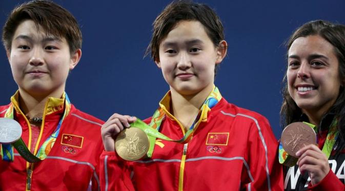 Atlet termuda yang berhasil merebut medali di Olimpiade Rio 2016, Ren Qian (Reuters)