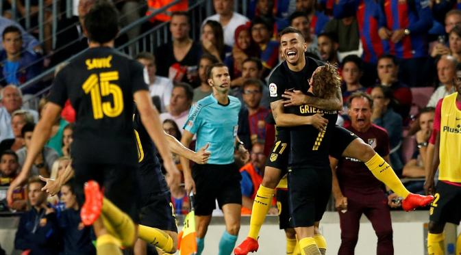 Ekspresi pemain Atletico Madrid, Angel Correa, setelah mencetak gol ke gawang Barcelona dalam laga pekan kelima La Liga Spanyol musim ini di Camp Nou, Kamis (22/9/2016) dini hari WIB. Skor berakhir imbang 1-1. (Reuters/Albert Gea)