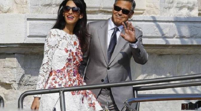 Amal bersama sang suami, George Clooney (Reuters)