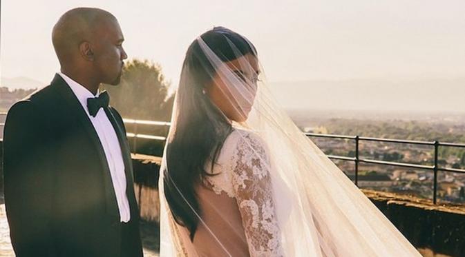 Kanye West dan Kim Kardashian menikah pada tahun 2014.