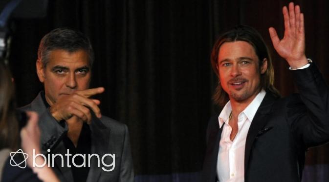 George Clooney telah menjadi salah satu sandaraan Brad Pitt dalam menghadapi masalahnya. (AFP/Bintang.com)