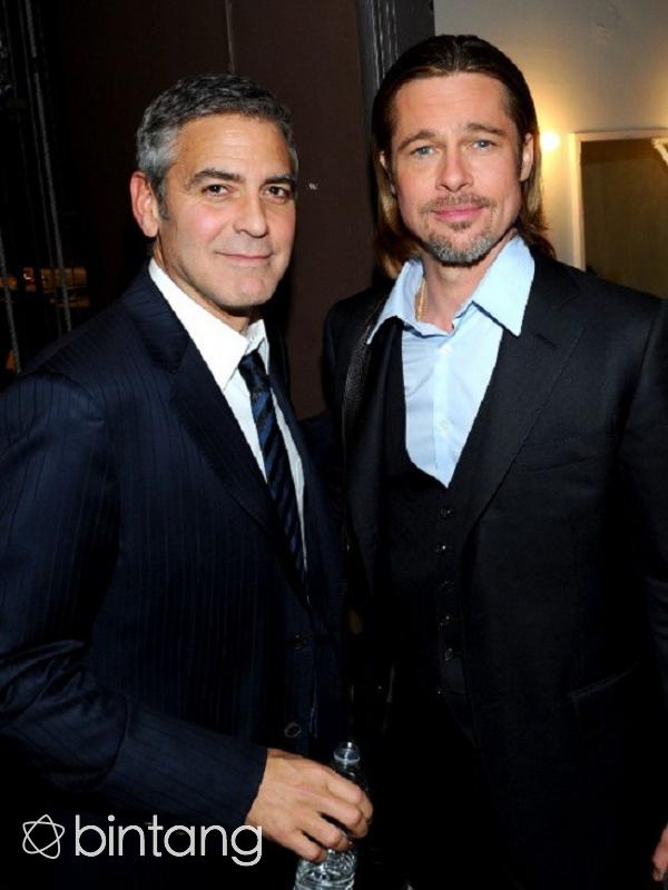 George Clooney telah menjadi salah satu sandaran Brad Pitt dalam menghadapi masalahnya. (AFP/Bintang.com)