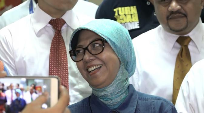 Ariyani, ibunda Kiswinar usai diperiksa sebagai saksi di Polda Metro Jaya. (Hasan Iskandar/Bintang.com)