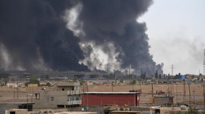 Masalah kesehatan menghantui penduduk Al-Qayyara akibat dibakarnya sumur minyak oleh ISIS (Reuters)