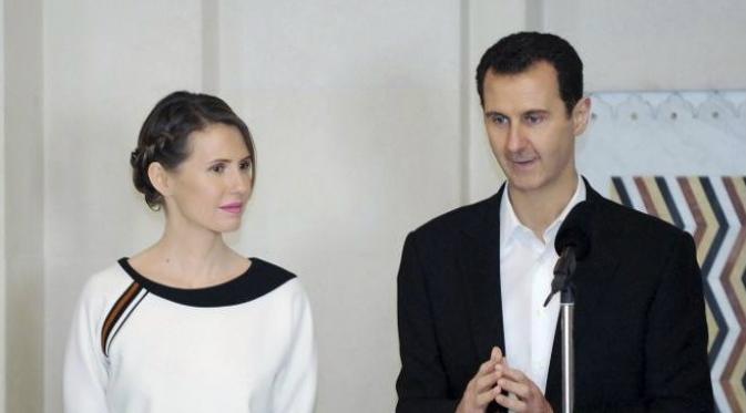 Ibu Negara Suriah, Asma al-Assad tampil bersama sang suami, Presiden Bashar al-Assad (Reuters)