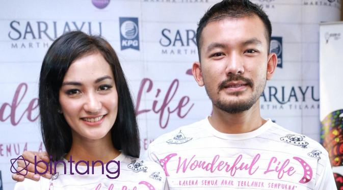 Setelah mendalami karakter peran ibu di film Wonderful Life, Atiqah Hasiholan ingin segera memiliki momongan. Begitu juga sang suami, yang menjadikan target segera menimang anak. (Adrian Putra/Bintang.com)