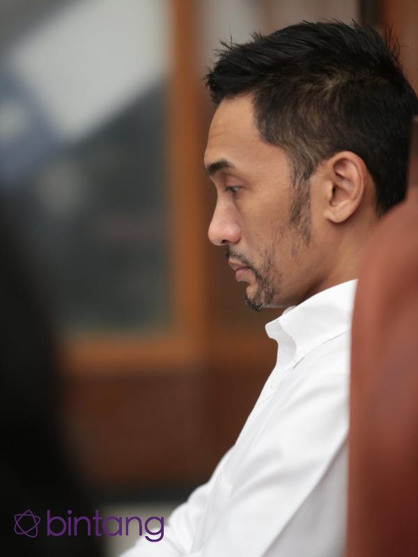 Restu Sinaga saat di persidangan. (Adrian Putra/Bintang.com)