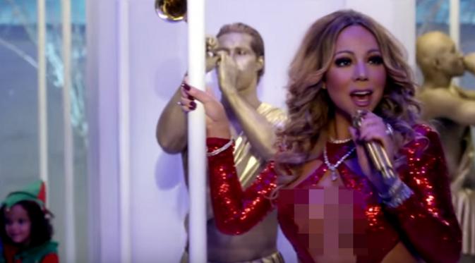 Mariah Carey dalam videoklip "Here Comes Santa Claues" (Youtube)