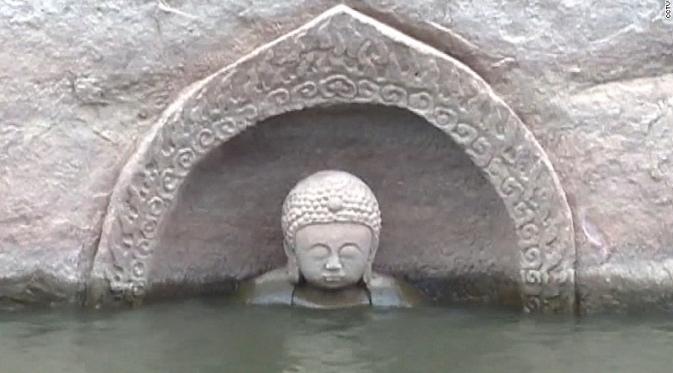 Patung Buddha kuno, yang diperkirakan berusia 600 tahun ditemukan di China (Xinhua)