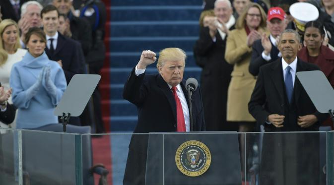 Saat pidato ada sejumlah hal yang Donald Trump garis bawahi adalah setiap warga yang selama ini merasa terlupakan, di pemerintahannya tidak akan terjadi lagi Washington DC, AS, Jumat (20/1). (AFP Photo)