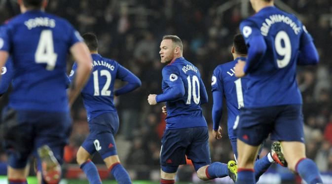 Pemain Manchester United (MU), Wayne Rooney usai membobol gawang Stoke City pada lanjutan Premier League di Bet365 Stadium, Stoke-on-Trent, (21/1/2017). Setan Merah bermain Imbang 1-1. (AP/Rui Vieira)