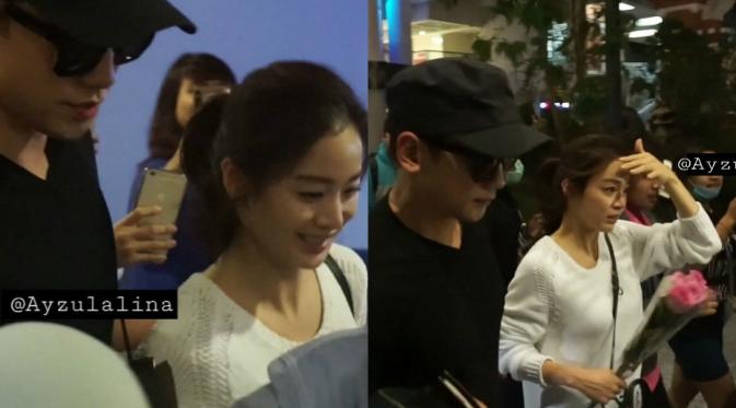 Rain dan Kim Tae Hee tiba di Bali [foto: twitter/@ayzulalina]