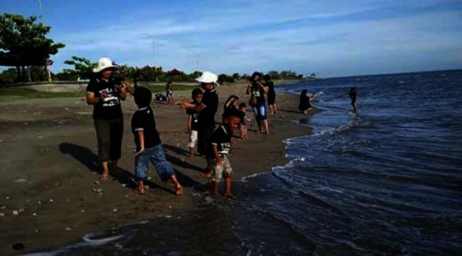 Suasana pagi hari di pantai pasir putih Korong Batu di Desa Baruga, Kecamatan Pajukukang, Kabupaten Bantaeng, Sulsel. (Liputan6.com/Eka Hakim)