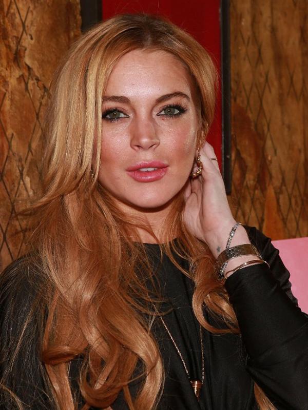 Lindsay Lohan akan meluncurkan fashion line yang diumumkan lewat media sosial. (AFP/Bintang.com)