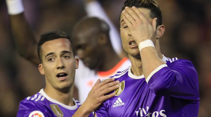 Meski memiliki banyak peluang, Cristiano Ronaldo hanya bisa mencetak satu gol untuk Real Madrid ke gawang Valencia. (AP Photo/Alberto Saiz)