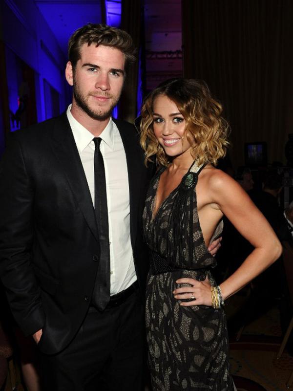 Miley Cyrus dan Liam Hamsworth (AFP/Bintang.com)