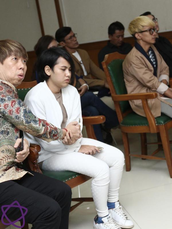 Aming dan Evelyn hadir dalam persidangan perceraian (Nurwahyunan/Bintang.com)