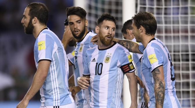Selebrasi Lionel Messi usai menjebol gawang Argentina. (AP Photo/Gustavo Garello)