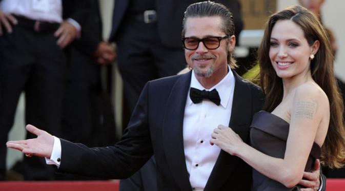 Brad Pitt menyusul Angelina Jolie dan anak-anaknya yang berada di Kamboja. (Foto: AFP)