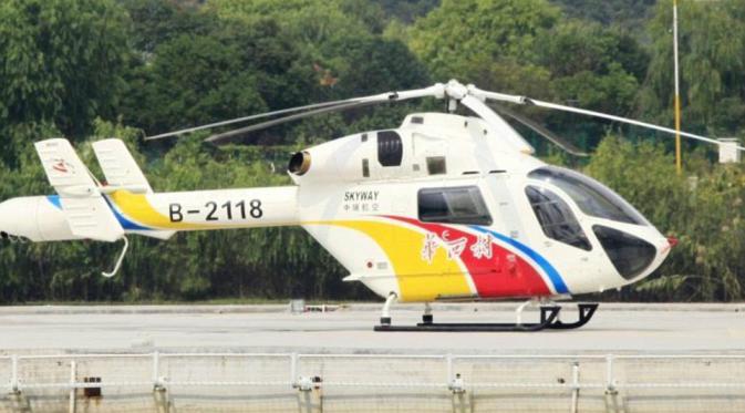 Helikopter sebagai aat transportasi di Huaxi. (People's Daily/Li Gen)