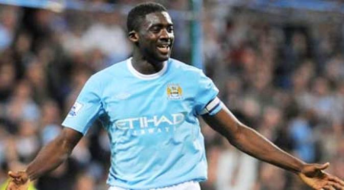 Kolo Toure menjadi satu di antara pemain Arsenal yang memutuskan hengkang ke Manchester City. (AFP/Andrew Yates)