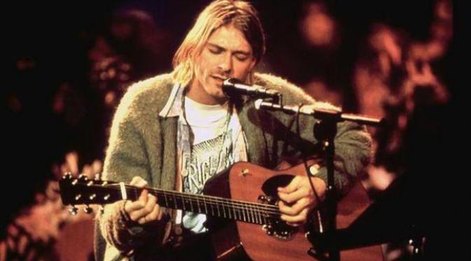 Kurt Cobain dan cardigan abu-abu historisnya.